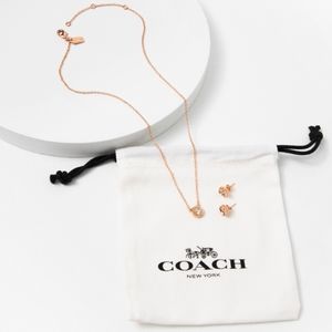 Coach open circle necklace and tea rose stud set